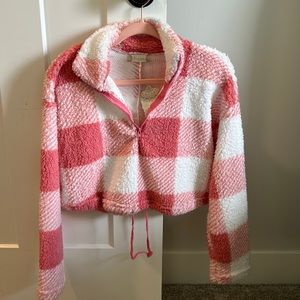 This quarter zip is in a size small and has never been worn before!